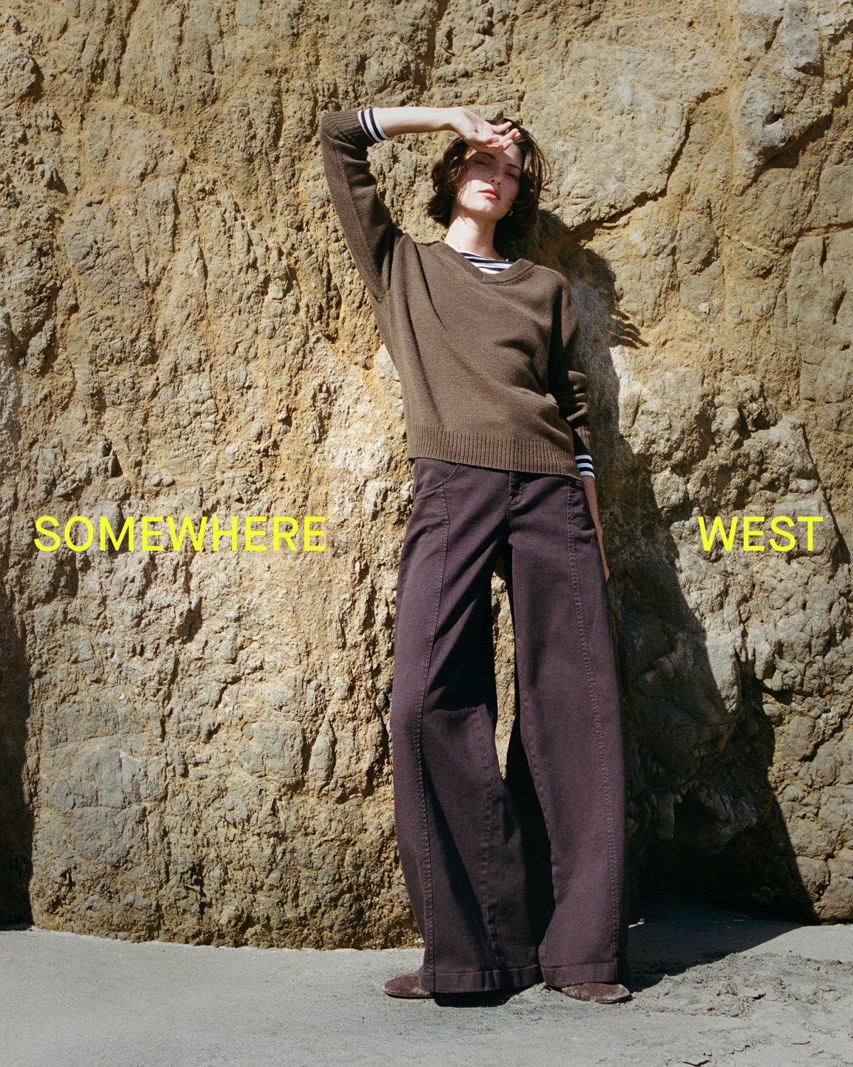 Editorial Image | Somewhere West | Model wearing Cashmere High V Boyfriend Sweater in Cocoa over Tissue Long-Sleeve Crew in Bone/Navy and Utility Seamed Wide-Leg Pant in Coffee Bean 