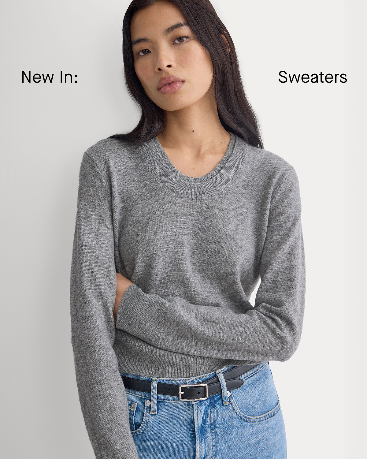 Image | New In: Sweaters | Model in Fine Cashmere Long-Sleeve U-Neck Sweater | Heathered Light Grey  