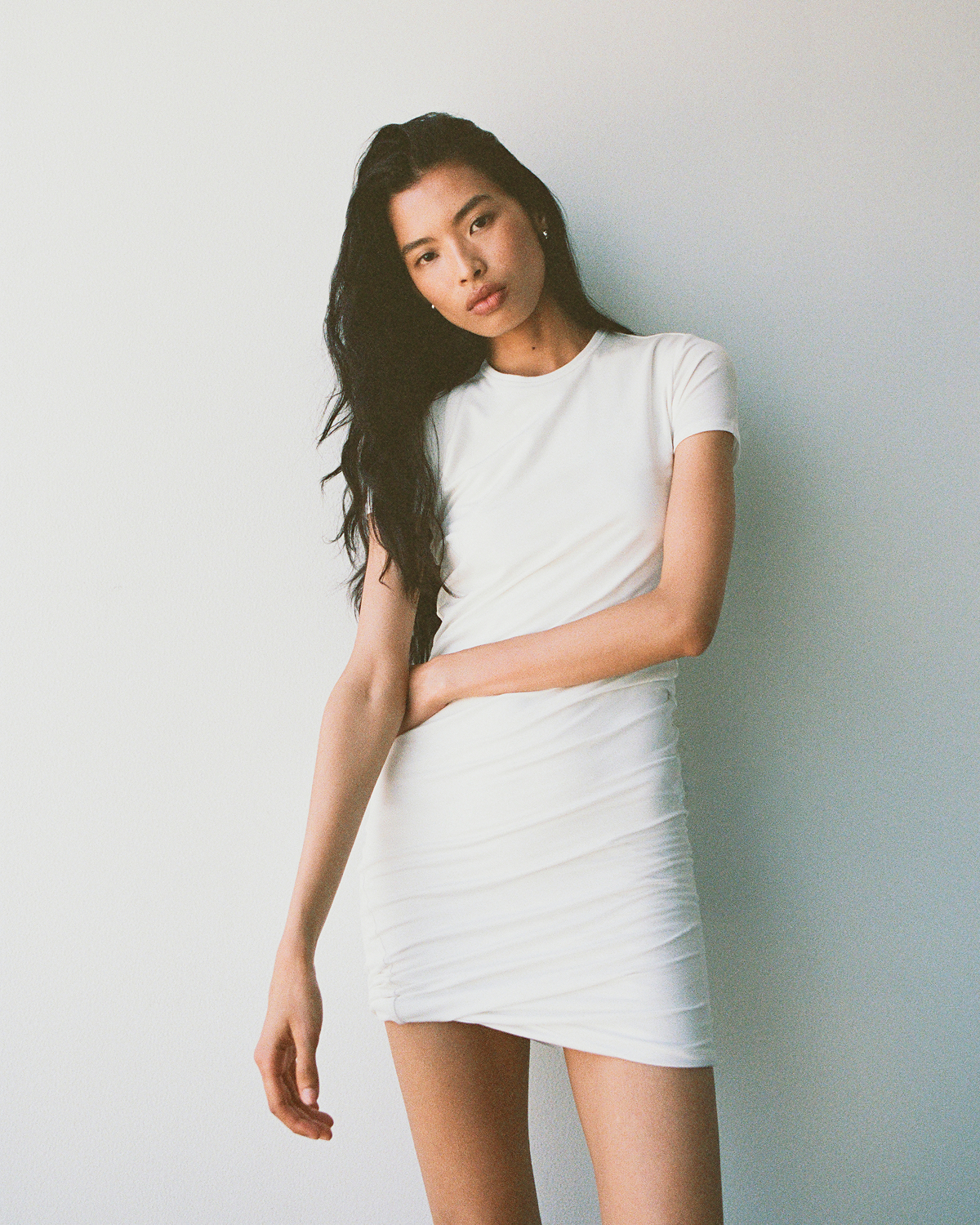  Editorial Image | Model in Twisted Short-Sleeve Crew Dress | White