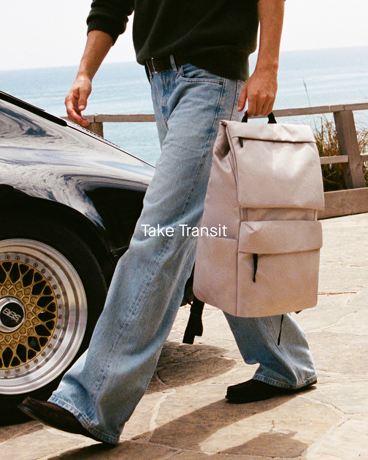 Image | Take Transit | Model with The ReNew Transit Backpack | Warm Quartz