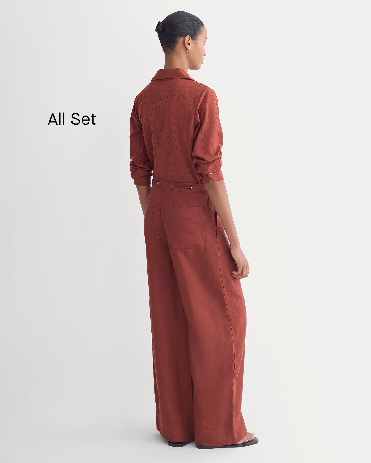 Image | All Set | Model wearing The Must-Have Shirt in Linen and Wide-Leg Drawstring Pant in Linen | Henna Red