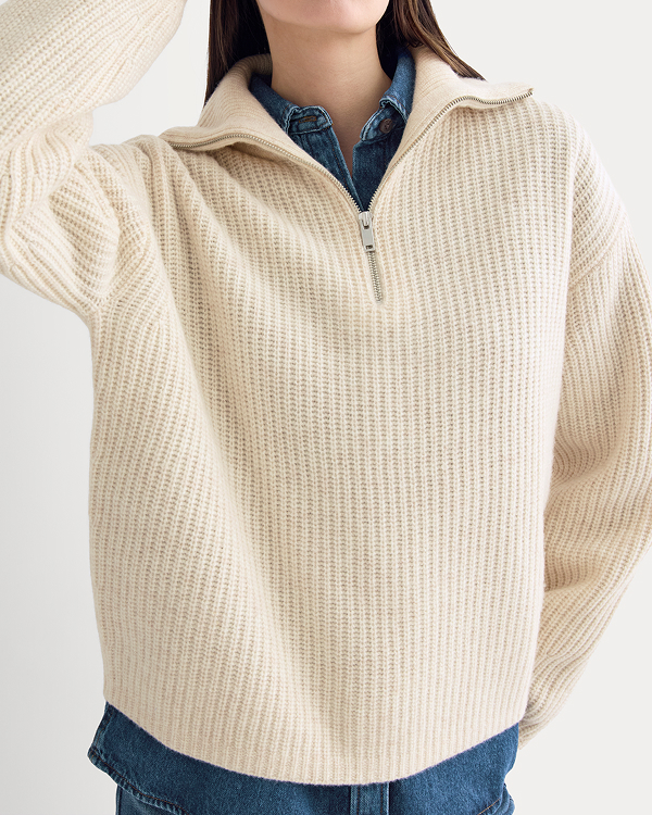 Image | Model in The Half-Zip Sweater in Luxe Merino | Heathered Oat