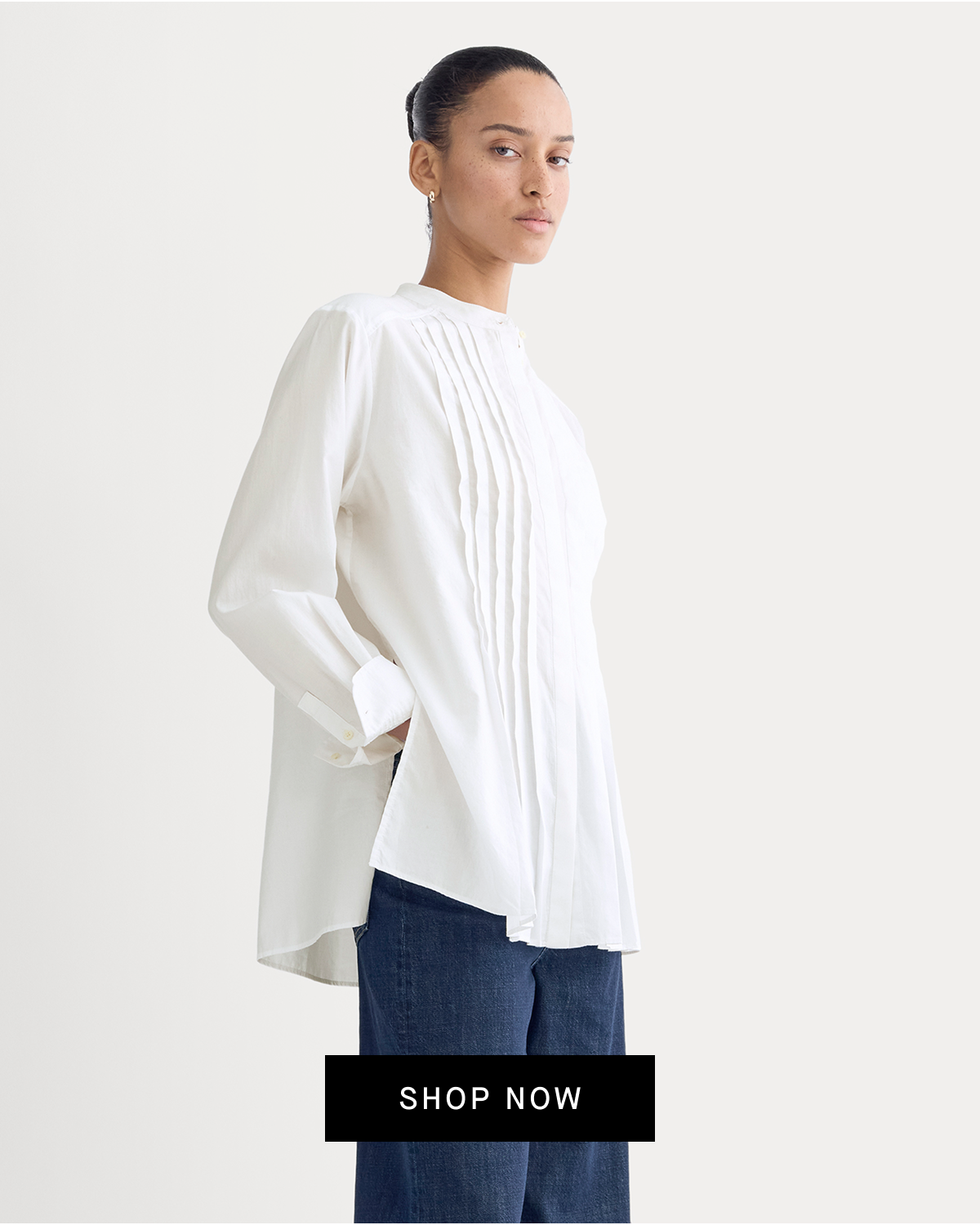 Image | Model in The Pleated Shirt in Silky Cotton | White