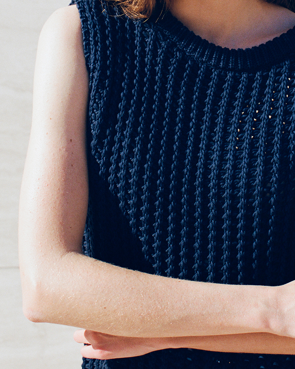 Image | Model in Open-Knit Tunic Vest in Elevated Cotton | Navy