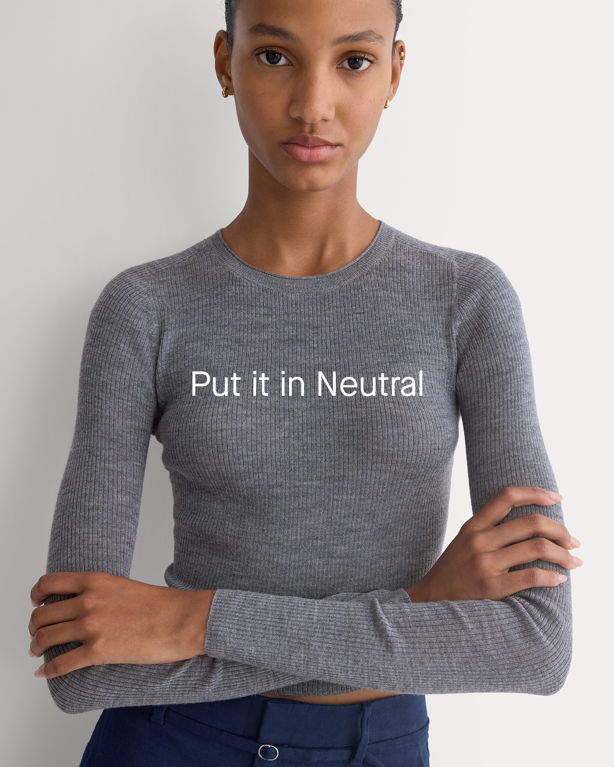 Image | Put it in Neutral | Model wearing The Cropped Crew Top in Ultrafine Merino in Heather Mid Grey  Black Heather Mid Grey