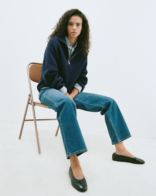 Image | Model in The Half-Zip Sweater in Luxe Merino | Navy