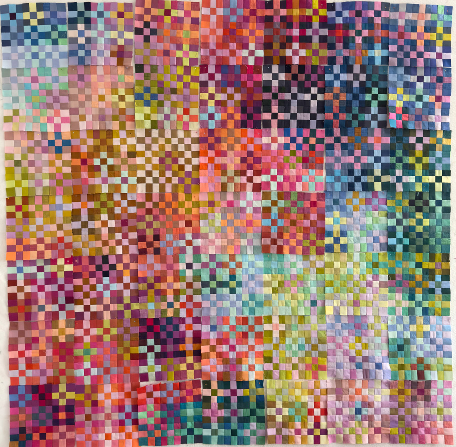 A full quilt made up of hundreds of small 9-patch blocks.