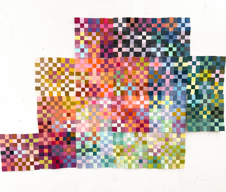 A quilt design in process made of 9 9-patch blocks.