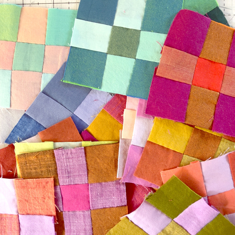 A small pile of 9-patch blocks