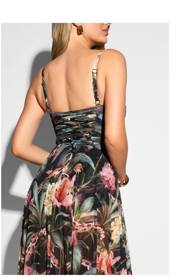Floral print dress with a lace-up back and thin straps, model shown from the back.