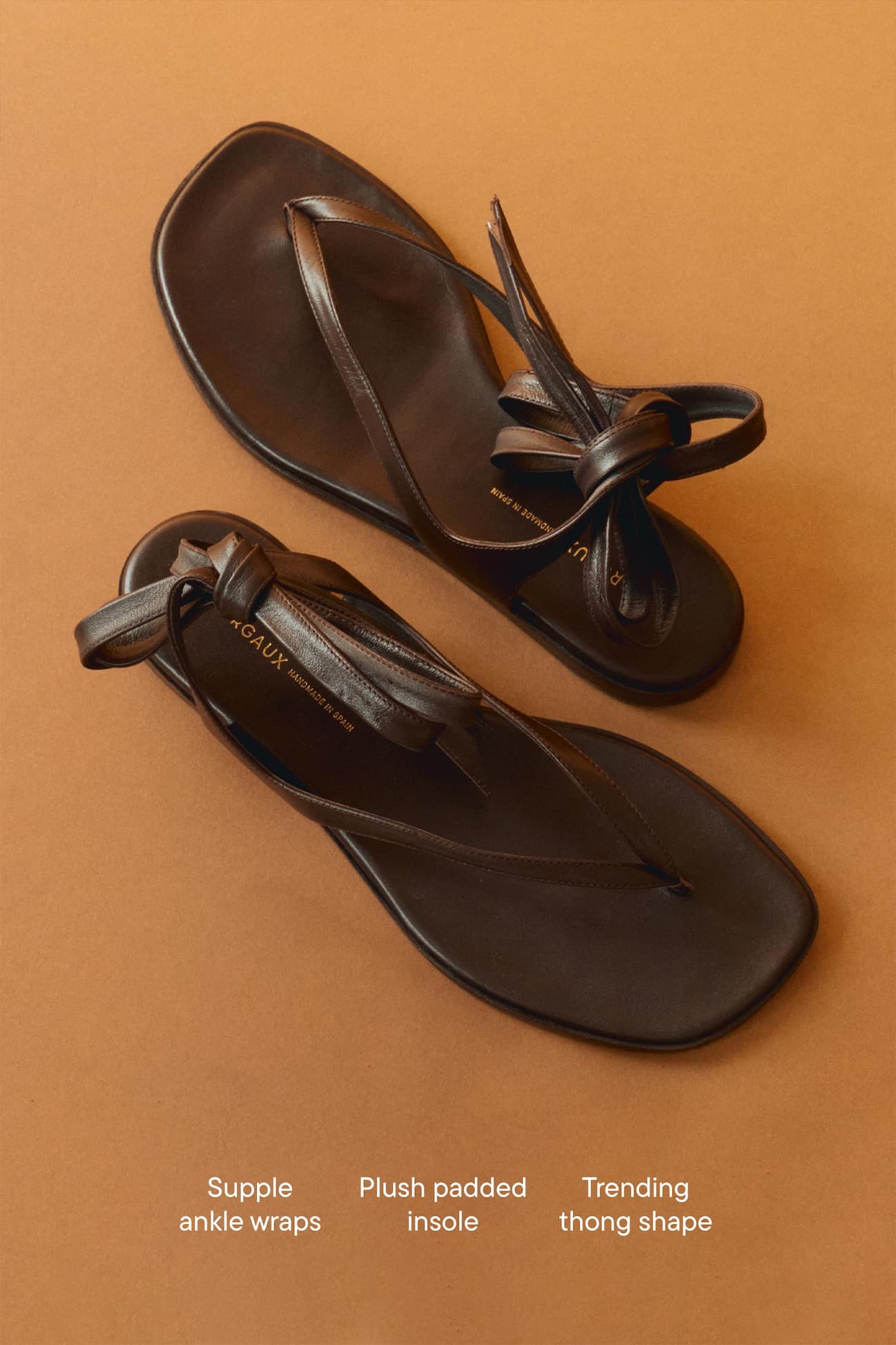Supple ankle wraps, plush padded insole and trending thong shape. 