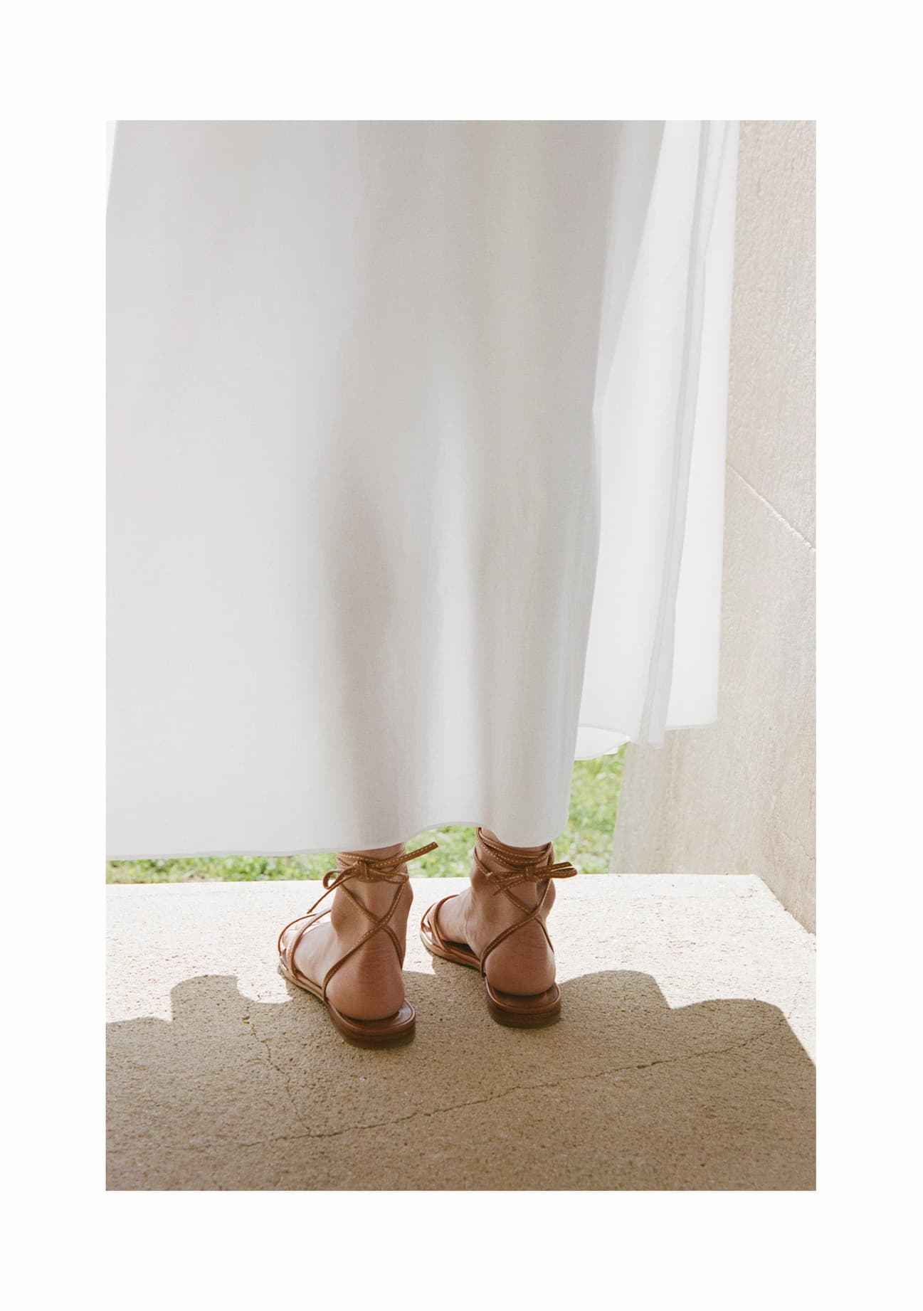The Wrap Sandal in Saddle Nappa.