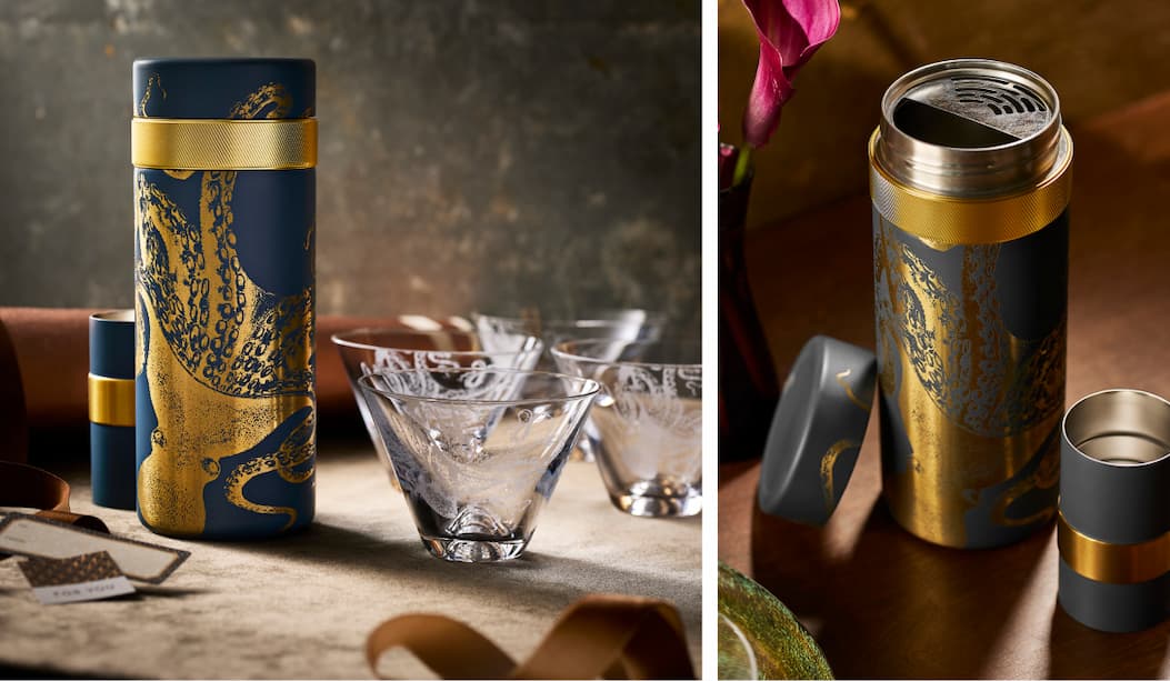 The Lucy batch cocktail shaker in navy blue and gold, also featuring the Lucy stemless martini glasses