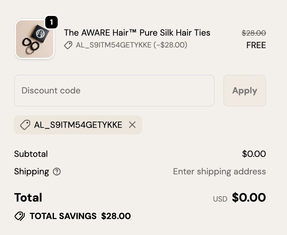 Checkout showing discount code applied with product price reduced to zero