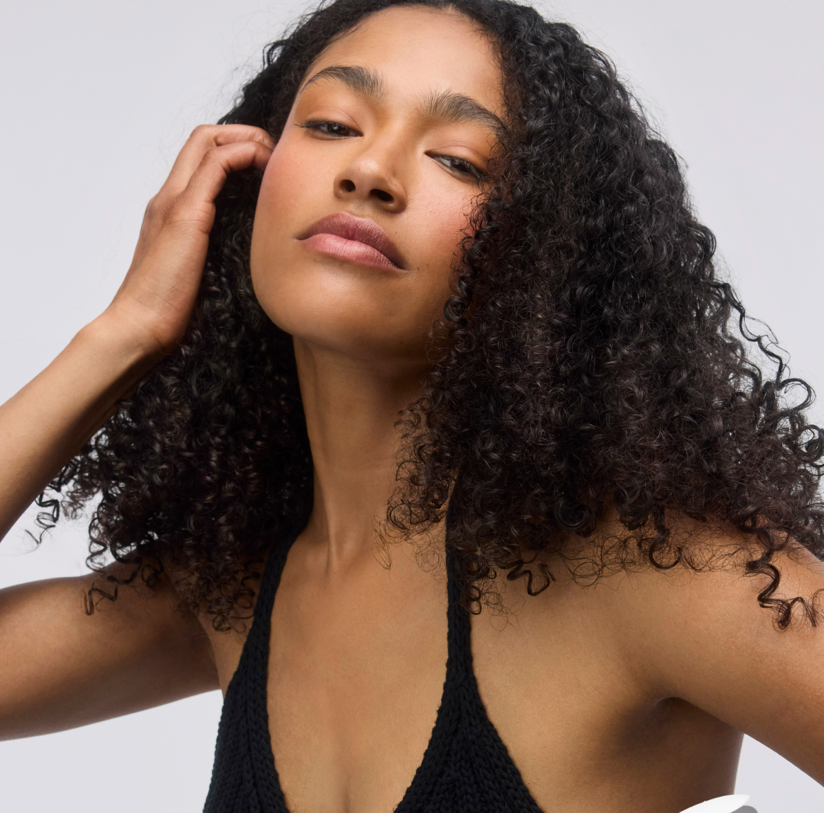 Model with curls while using Textured Trio 