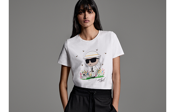 an image of a woman wearing a white shirt and black pants