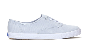 A side view of the Keds Champion Canvas Lace-Up in light blue.