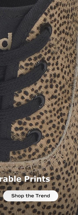 Text on the bottom of the image says, Wildly wearable prints. Shop the trend.