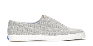 A side view of the Keds Champion Round Toe Crosshatch Textile Slip-On in grey.