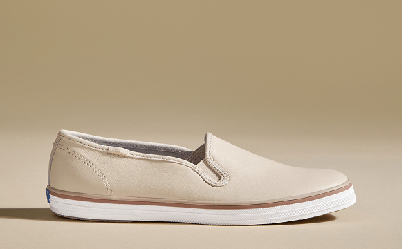 A side view of the Keds Champion Leather Slip-On in blush.