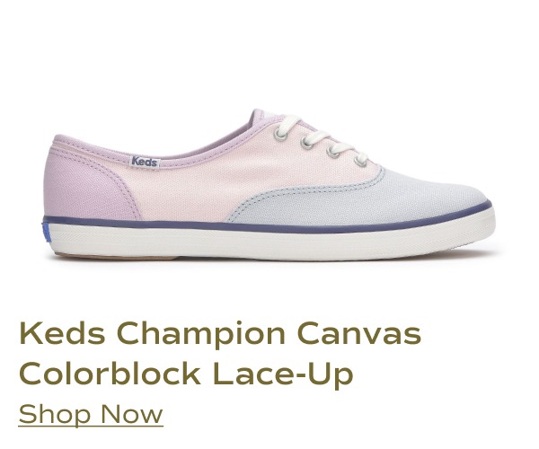 A side view of the Keds Champion Canvas Colorblock lace-up shoe in a pastel pink, blue, and lilac purple combination. Shop Now.