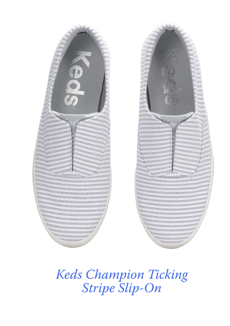 A top-down view of the Keds Champion Round Toe Ticking Stripe Slip-On shoes in grey. Shop Now.