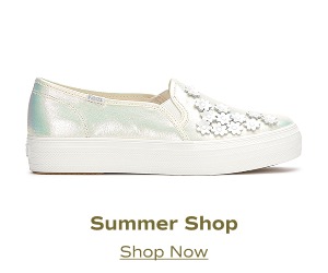 A side view of the Keds Triple Decker Canvas Floral Embellished Celebrations slip-on in an iridescent finish. Shop the Summer Shop.