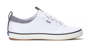 A side view of the Center III Canvas Slip-On in white/navy.