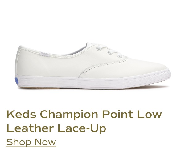 A side view of the Keds Champion Point Low Leather lace-up shoe in a white. Shop Now.