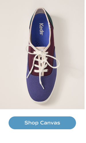 A top-down view of the Keds Champion Colorblock Canvas Lace-Up in navy/burgundy/green. Shop Canvas.