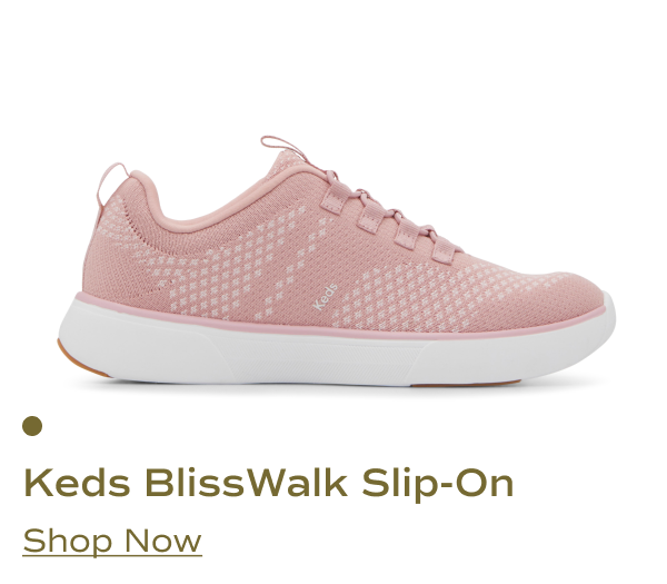 A side view of the Keds BlissWalk knit slip-on shoe in dusty rose pink, featuring a breathable knit upper, stretchy pink fixed laces, and a cushioned white outsole. Shop Now.
