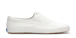 A side view of the Keds Champion Round Toe Daisy Eyelet ​Slip-On in snow white.