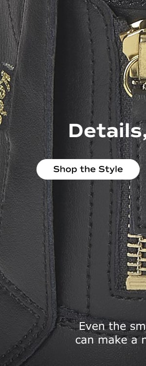 A zoomed-in view of the golden metal zipper closure on the Pursuit Zip Leather in black. Shop the Style.