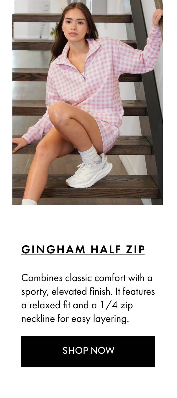 GINGHAM HALF ZIP Combines classic comfort with a sporty, elevated finish. It features a relaxed fit and a 1/4 zip  neckline for easy layering. SHOP NOW