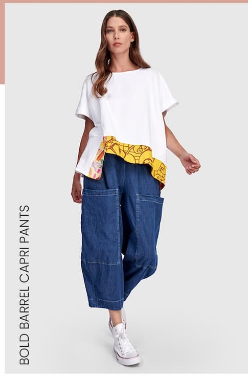 an image of a woman in a white shirt and yellow pants