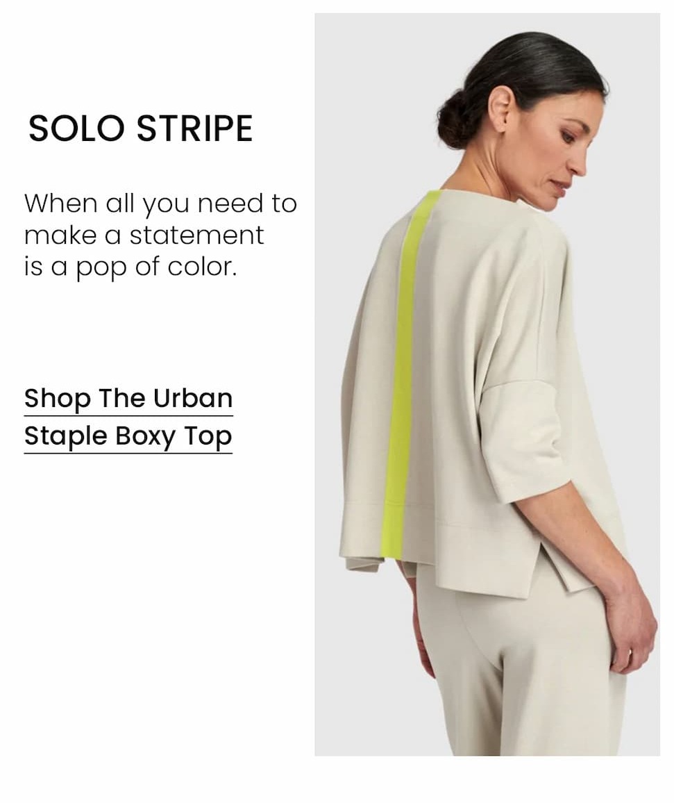 an image of a woman in a dress and sandals standing in front of a bouquet of flowers