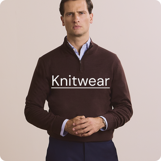 Man wearing burgundy quarter zip
