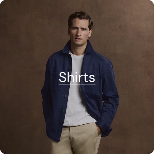 man wearing white t shirt and blue overshirt