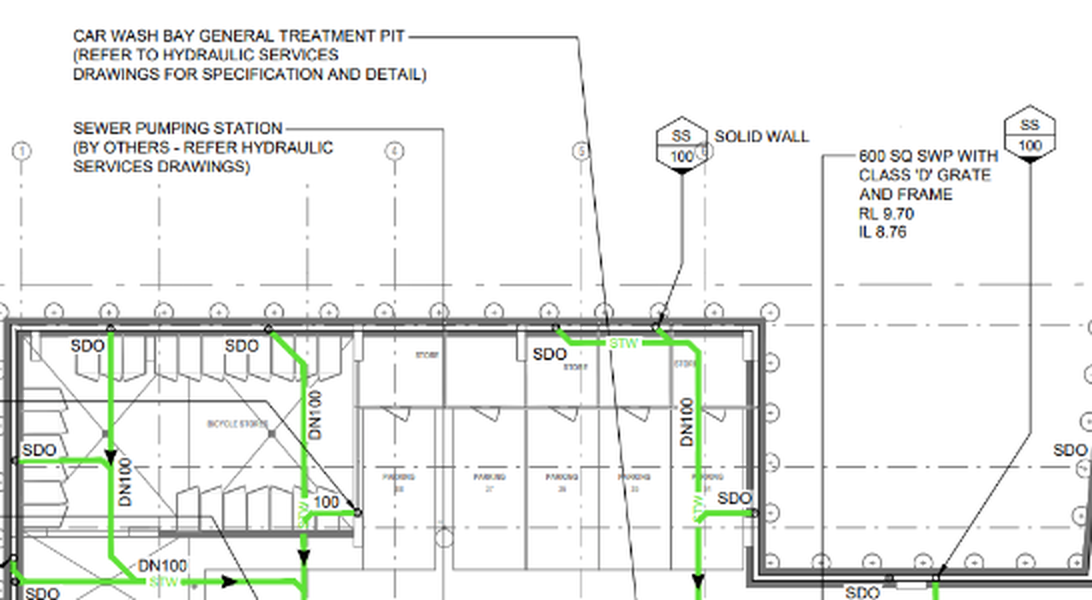 Detail of the civil stormwater plan showing the car wash bay treatment pit referring out to the hydraulic services drawings