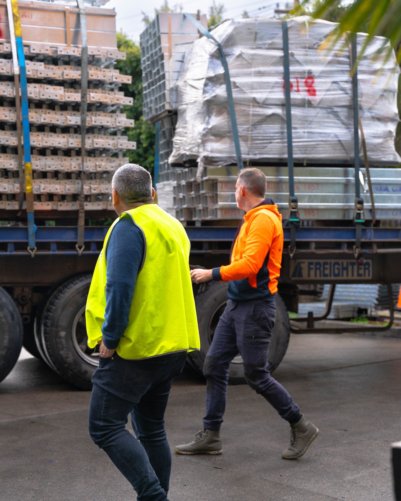 Palletised stock being loaded onto a truck for dispatch