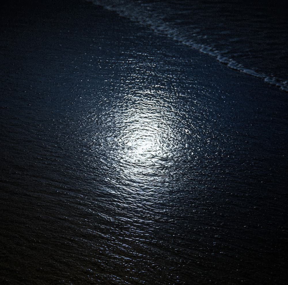 Moon reflection in sand