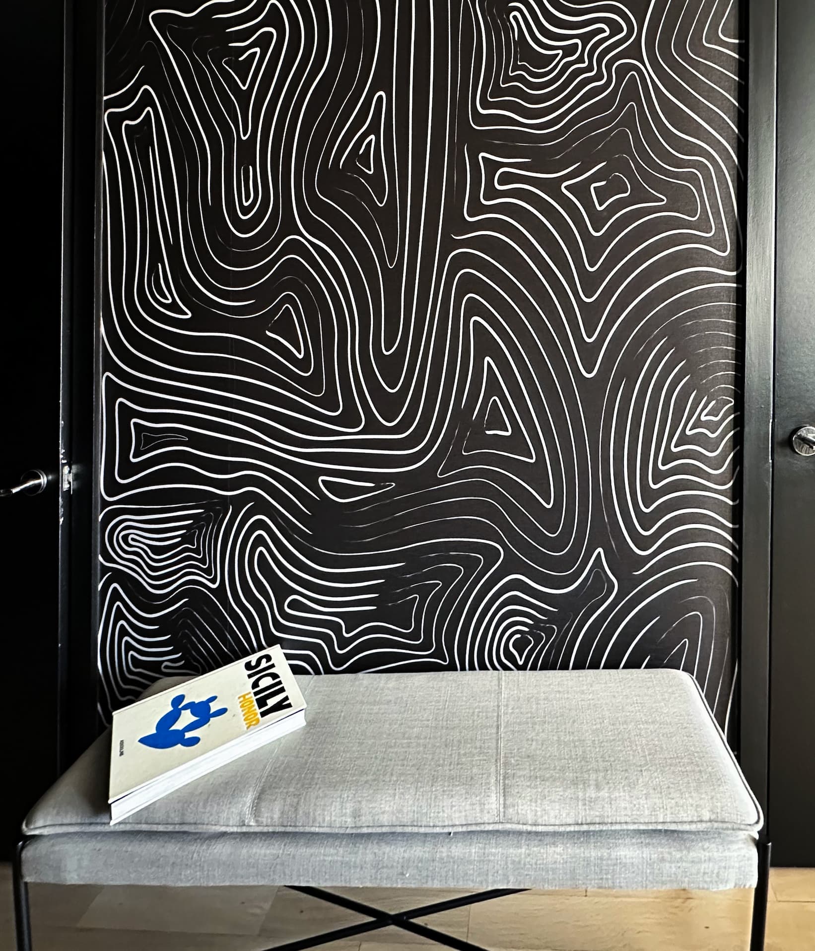 MAZE | GRAPHITE wallcovering in a Flatiron loft entryway designed by Anna Powers