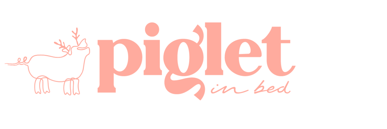 Piglet in Bed Festive Logo