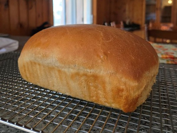 A fresh baked loaf of honey sweetened sandwich bread