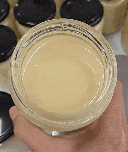 A freshly packed bottle of our white honey, before it has fully set in the jar!