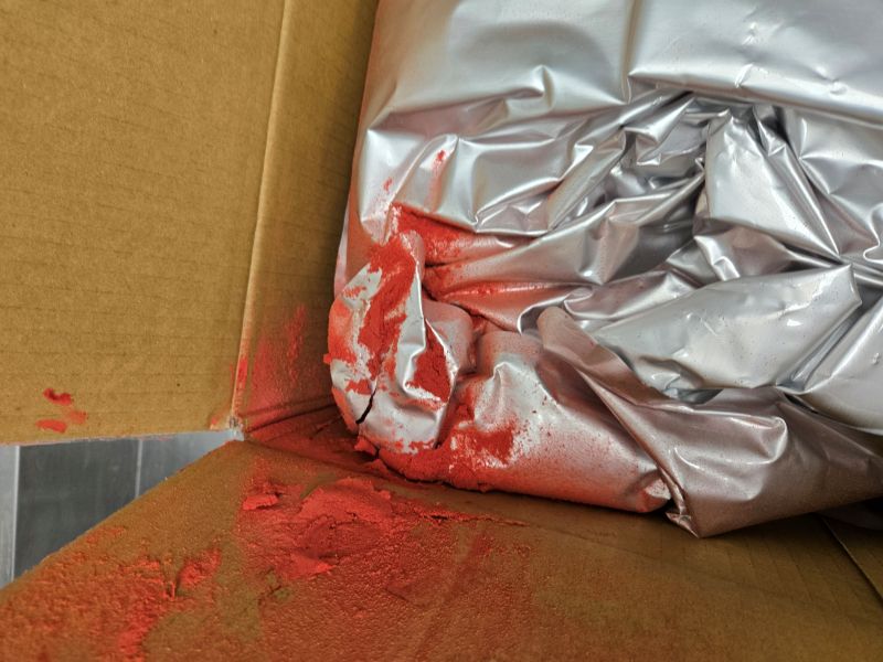 Punctured bag of freeze-dried fruit powder for honey flavoring