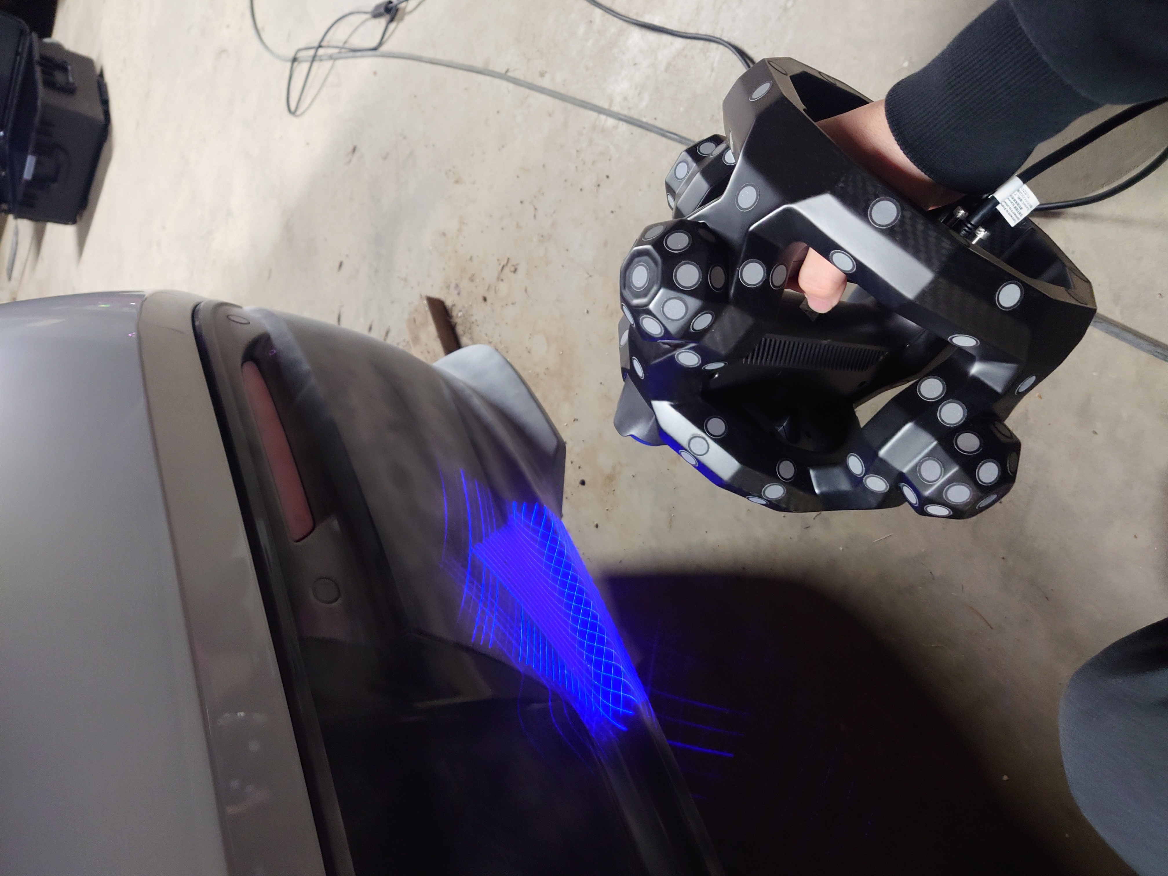 Trackit scanner in use on a vehicle in the workshop