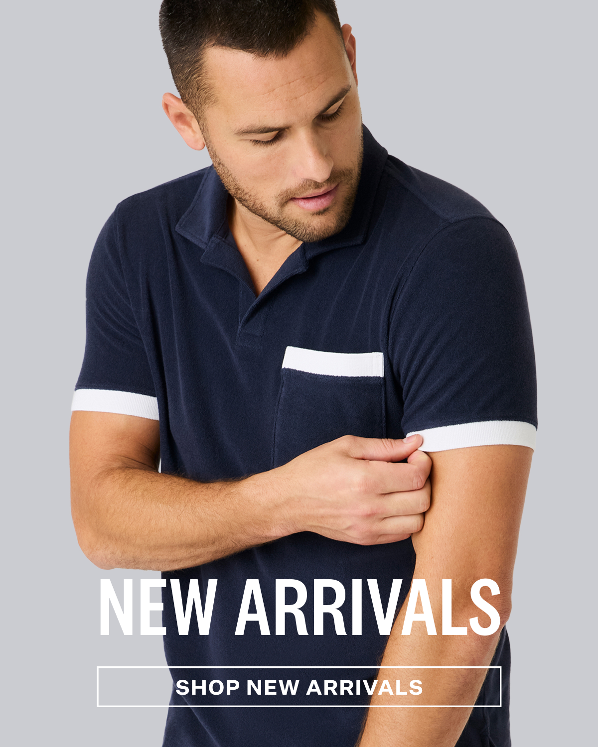 Man wearing Terry Cloth Johnny Collar Polo in Night Sky with Text "New Arrival" and a SHOP NEW ARRIVALS button at the bottom