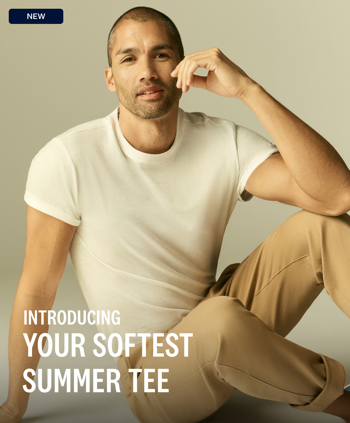 Man wearing Slub Crew Neck T-Shirt in Bright White. With text "Intrdoucning Your softest summer tee" 