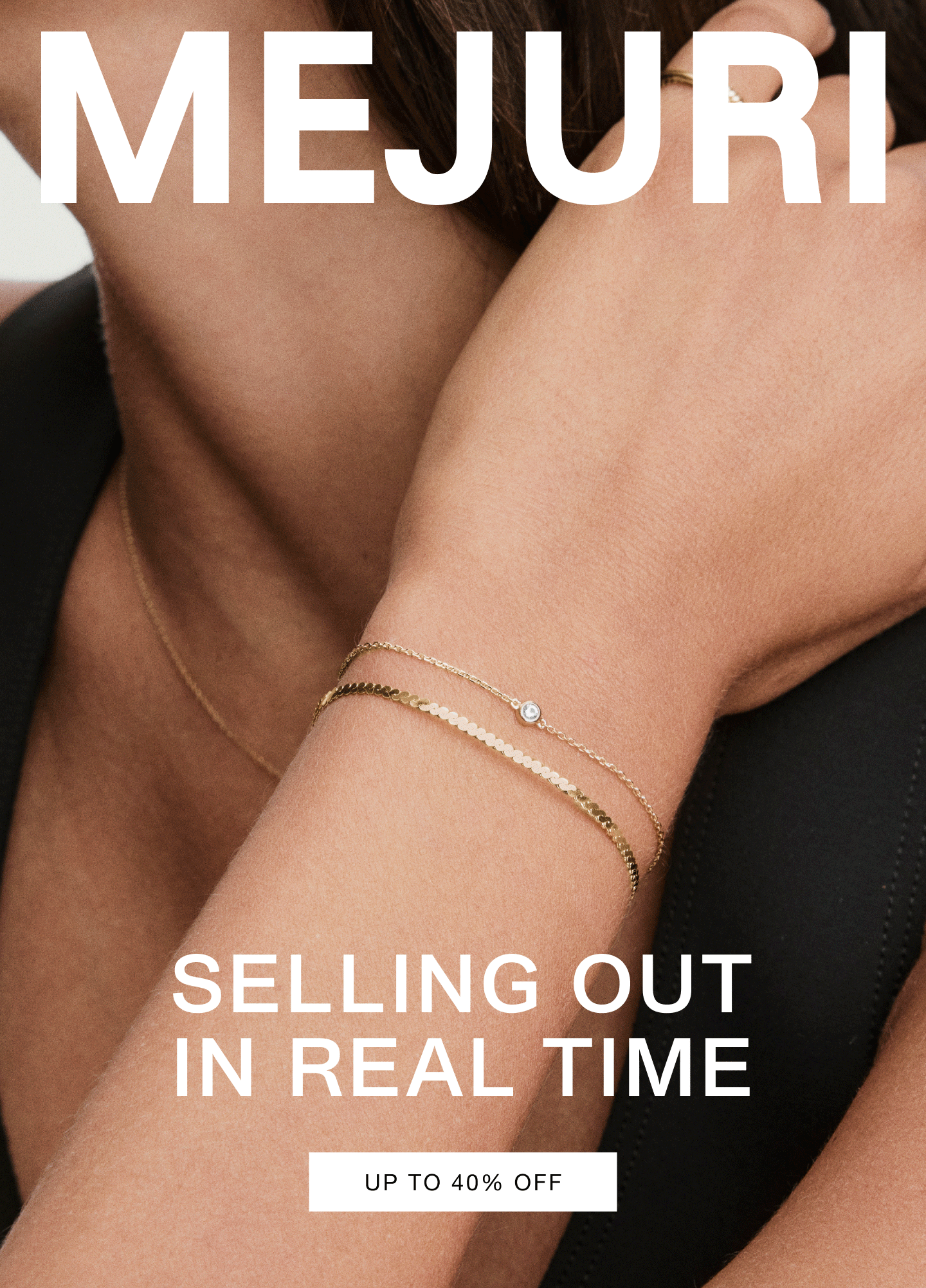 Woman wearing a silver open heart pendant necklace and gold layered bracelets. Text reads: Selling Out In Real Time — Up to 40% Off.